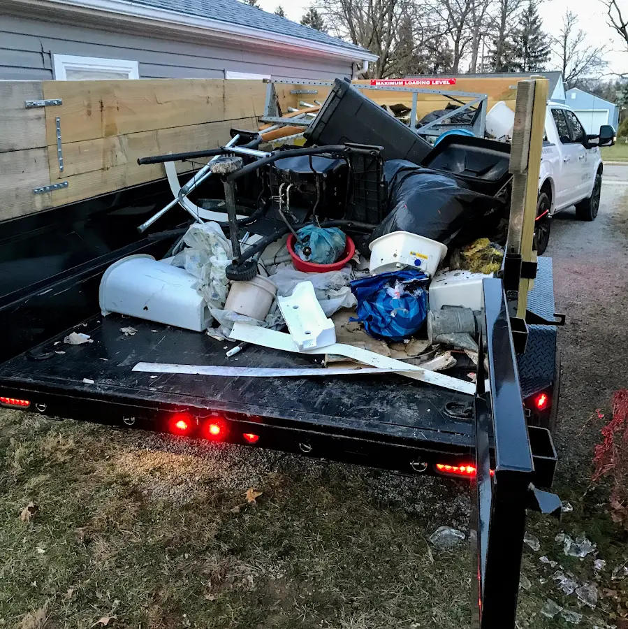 Roll-off dumpster delivered to a residential driveway in LaFayette